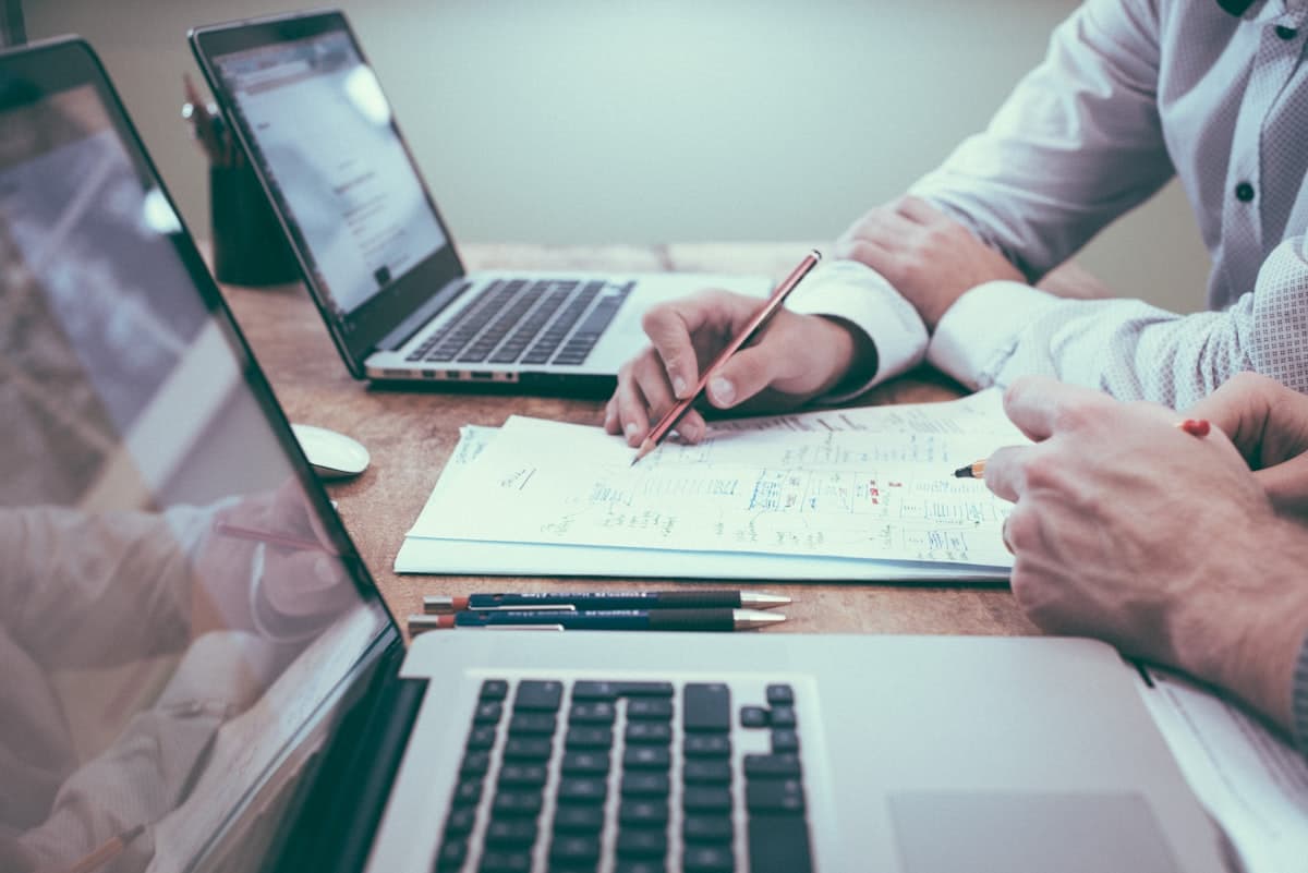 Professionals reviewing legal documents together